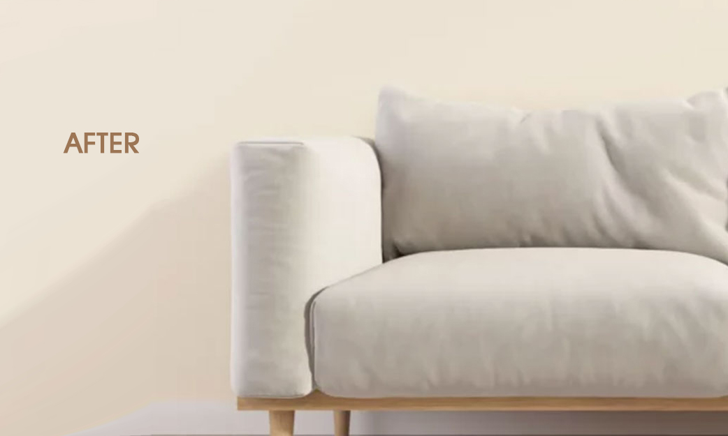 young cleaner in uniform and cap cleaning modern armchair with v